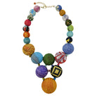 A multicolor necklace made with large beads is shown against a white background.