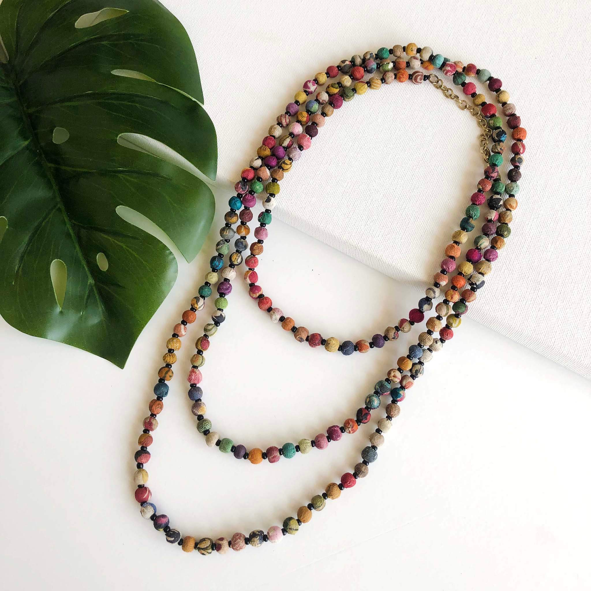 Long strand bead necklace shop