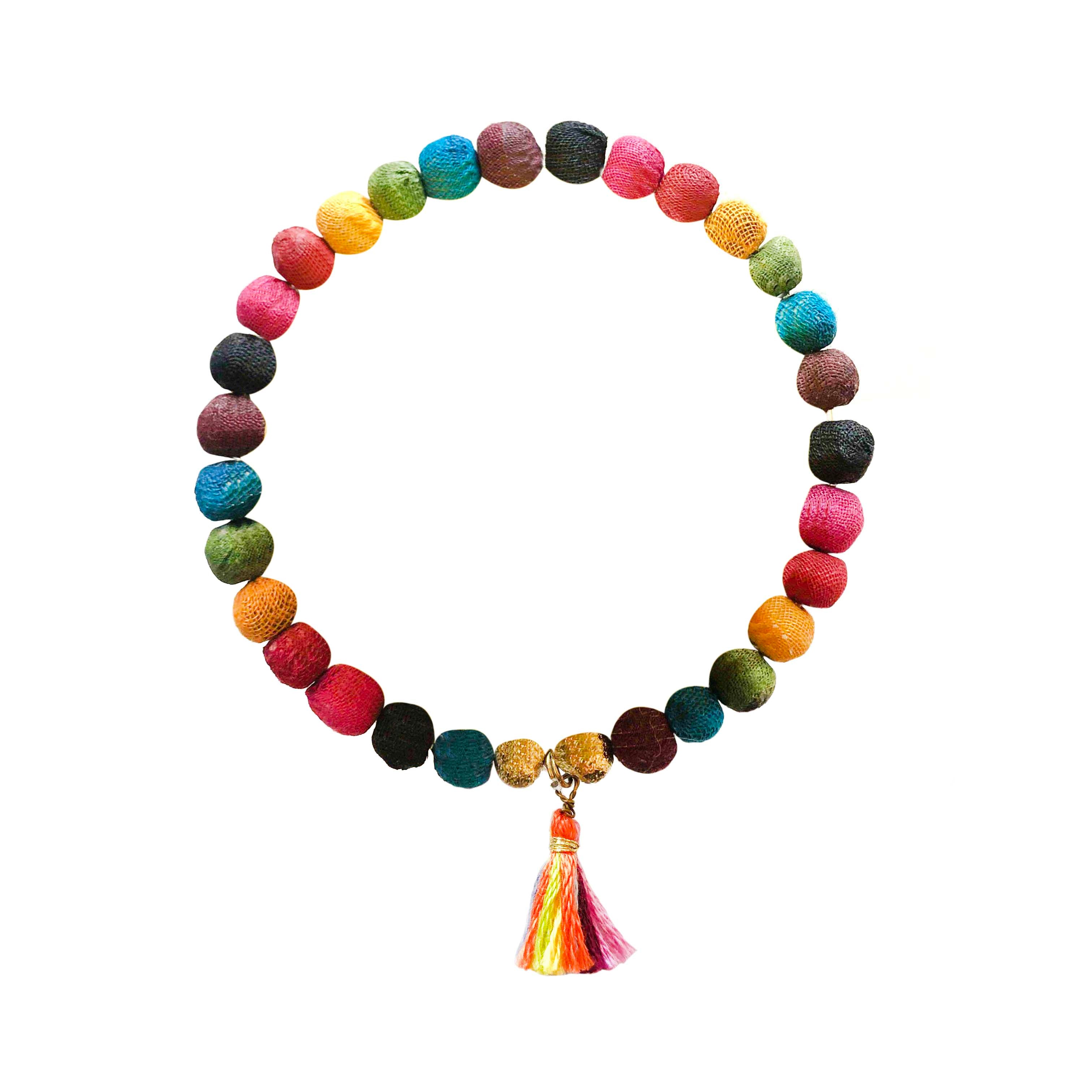 A rainbow beaded bracelet against a white background.